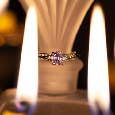0.40ct natural alexandrite oval cut ring in 18k white gold with diamond accents